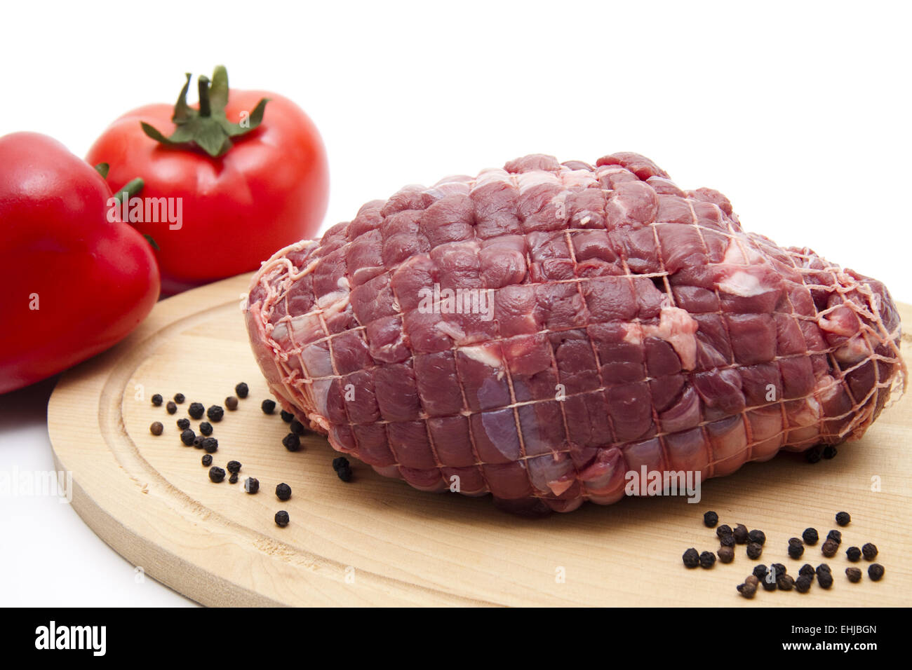 Roast venisons with tomato Stock Photo