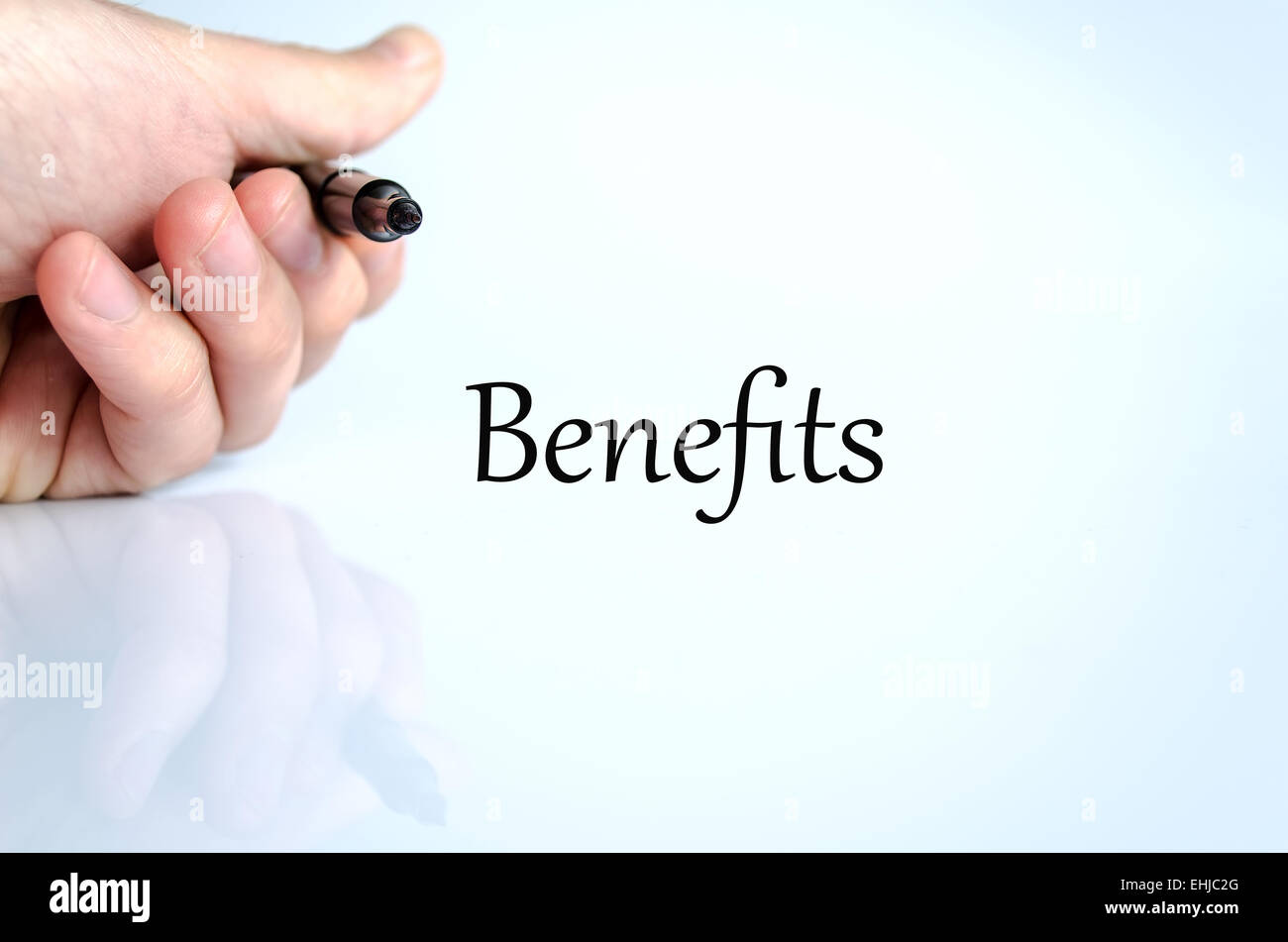 Pen in the hand isolated over white background benefits Stock Photo Alamy