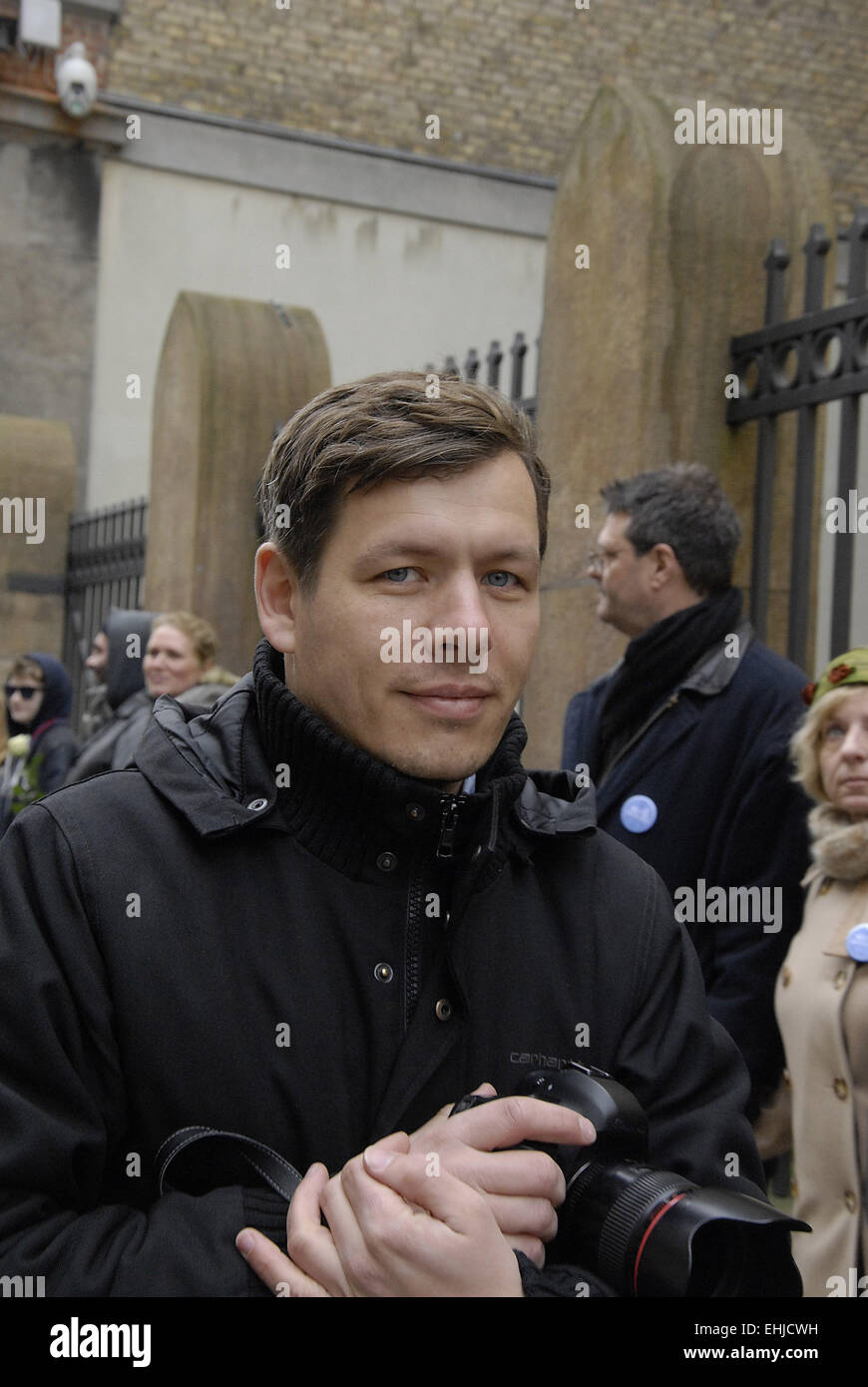 Copenhagen, Denmark. 14th Mar, 2015. Mads Nissen is winner of the world Press photo 2014 serie from Rusisian gay life Mad is working for dnish largest daily Berlingske /scanpix photo agency , Moday on sunday Mads is covering human chain around jews synagogue today at krystalgade in Copenhaghen Credit:  Francis Dean/Alamy Live News Stock Photo