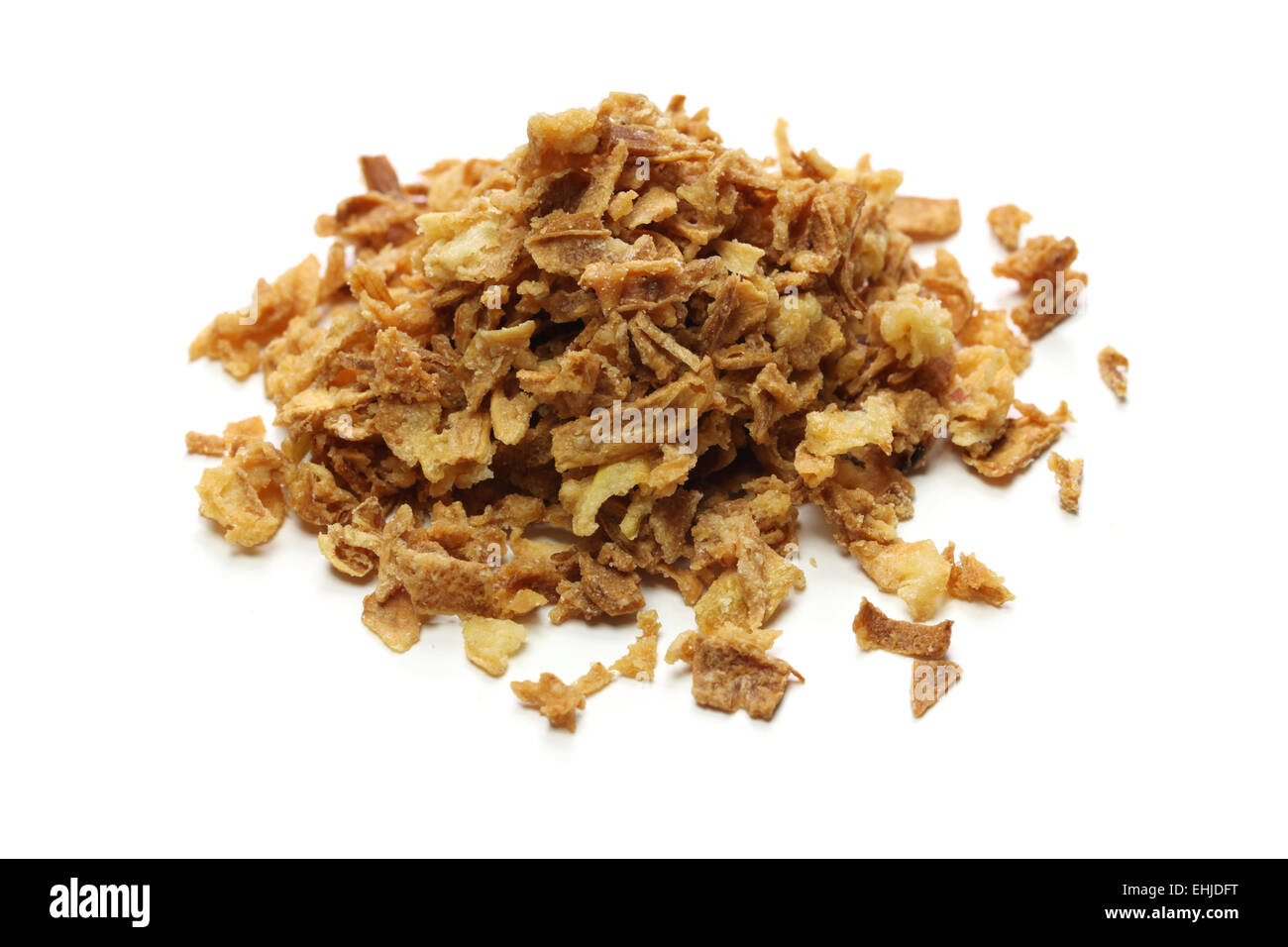 crispy fried onion flakes on white background Stock Photo