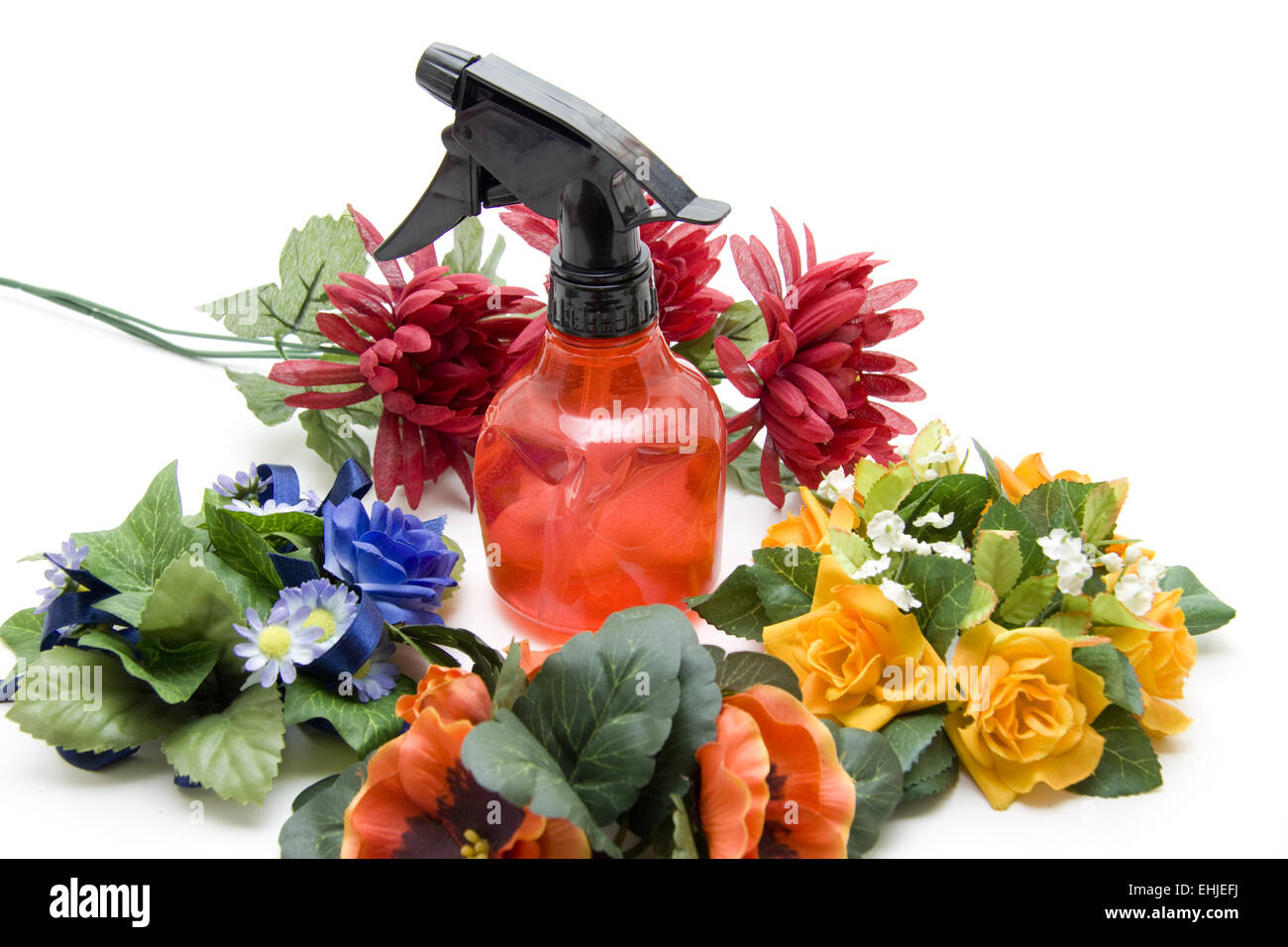Spray bottle with flowers Stock Photo