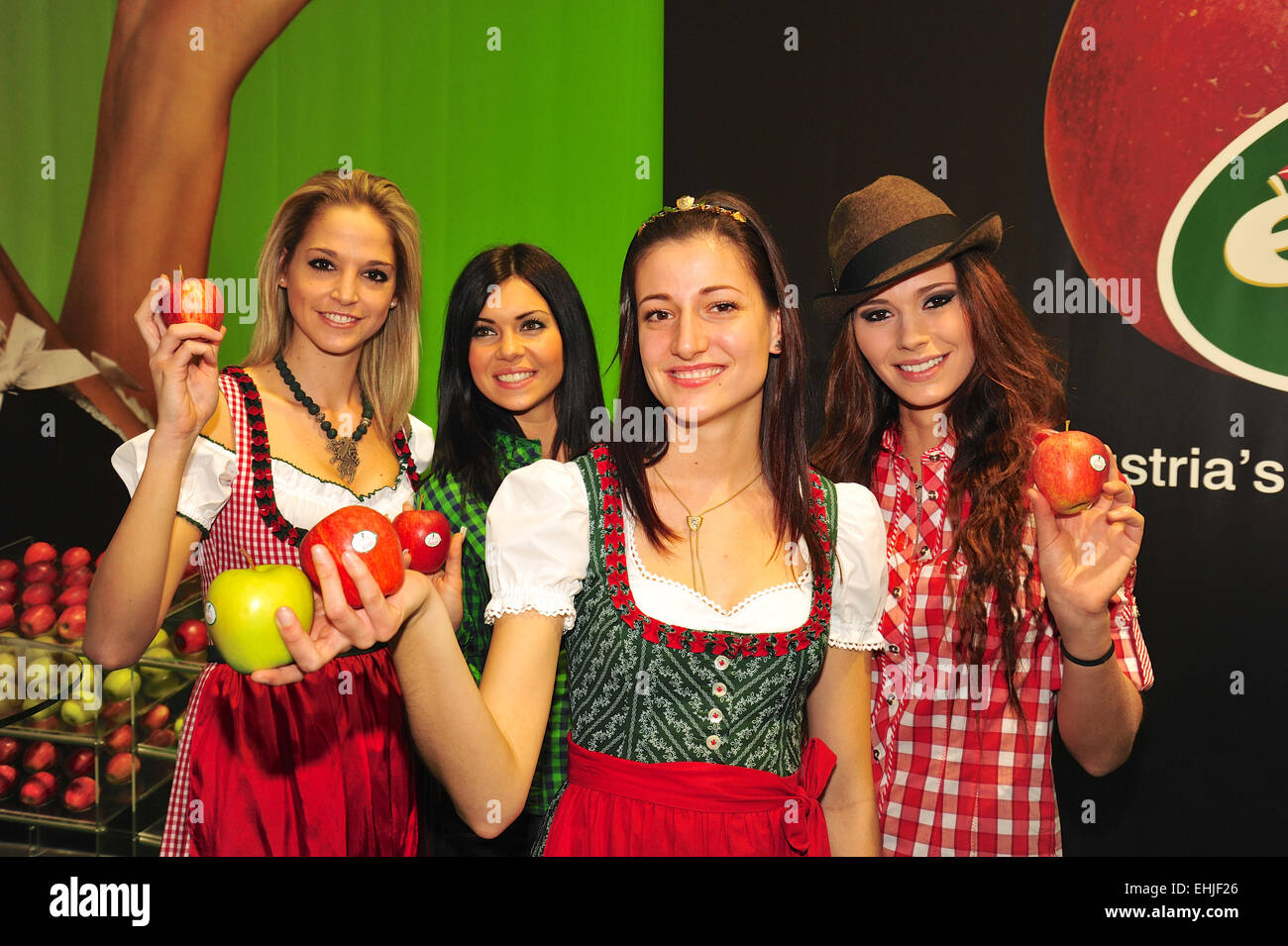 Young and pretty girls with apples Stock Photo