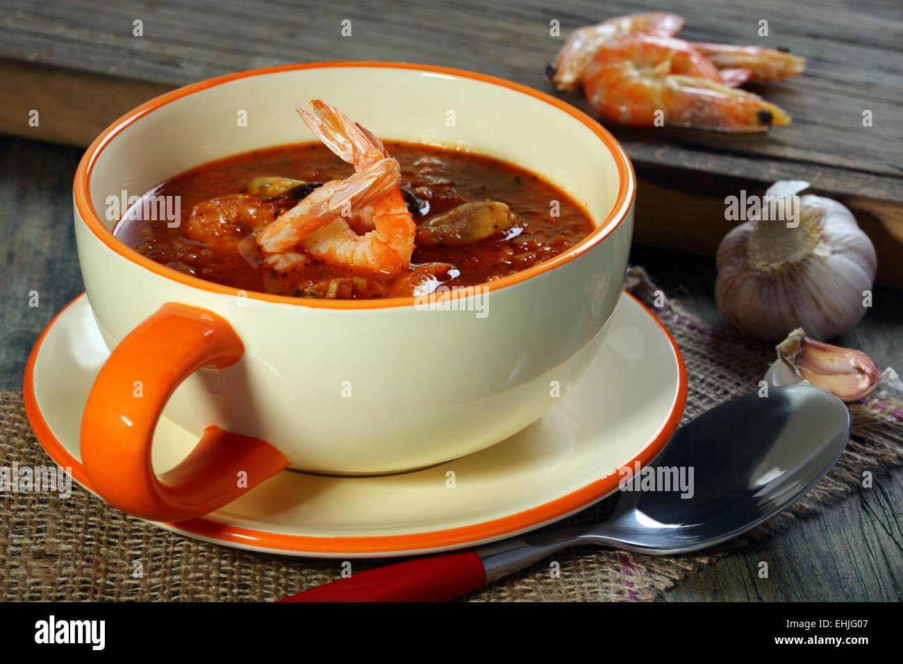 Tomato soup with mussels and shrimp. Stock Photo