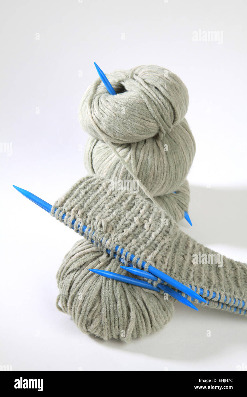 needle play with wool Stock Photo