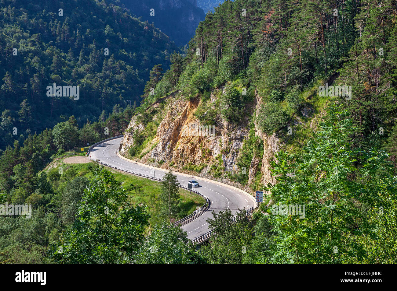 Narrow alpine highway in Alps, France (view from above). Stock Photo