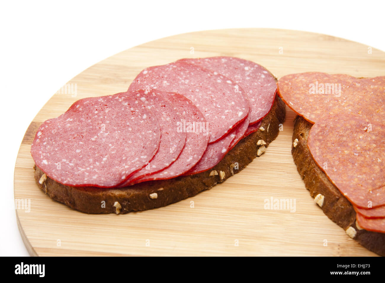 Salami with bread Stock Photo Alamy