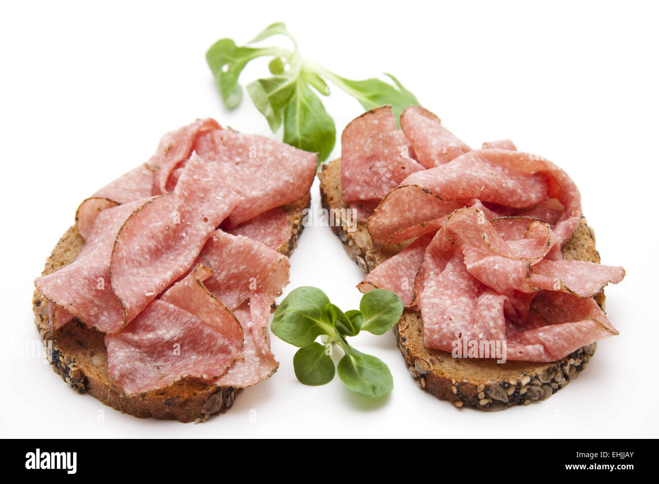 Salami on bread Stock Photo Alamy