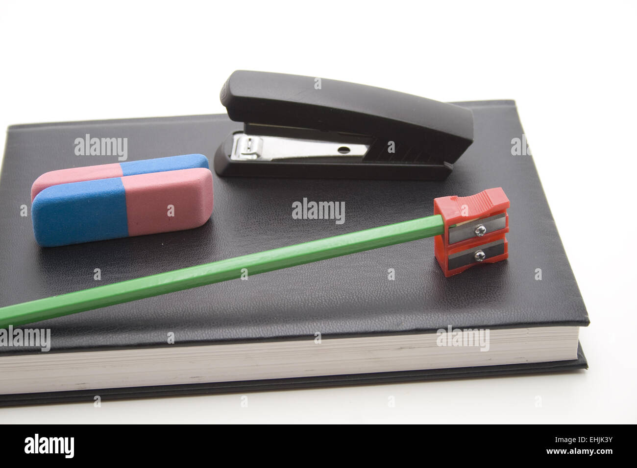 Colored pencil and eraser with sharpener Stock Photo Alamy