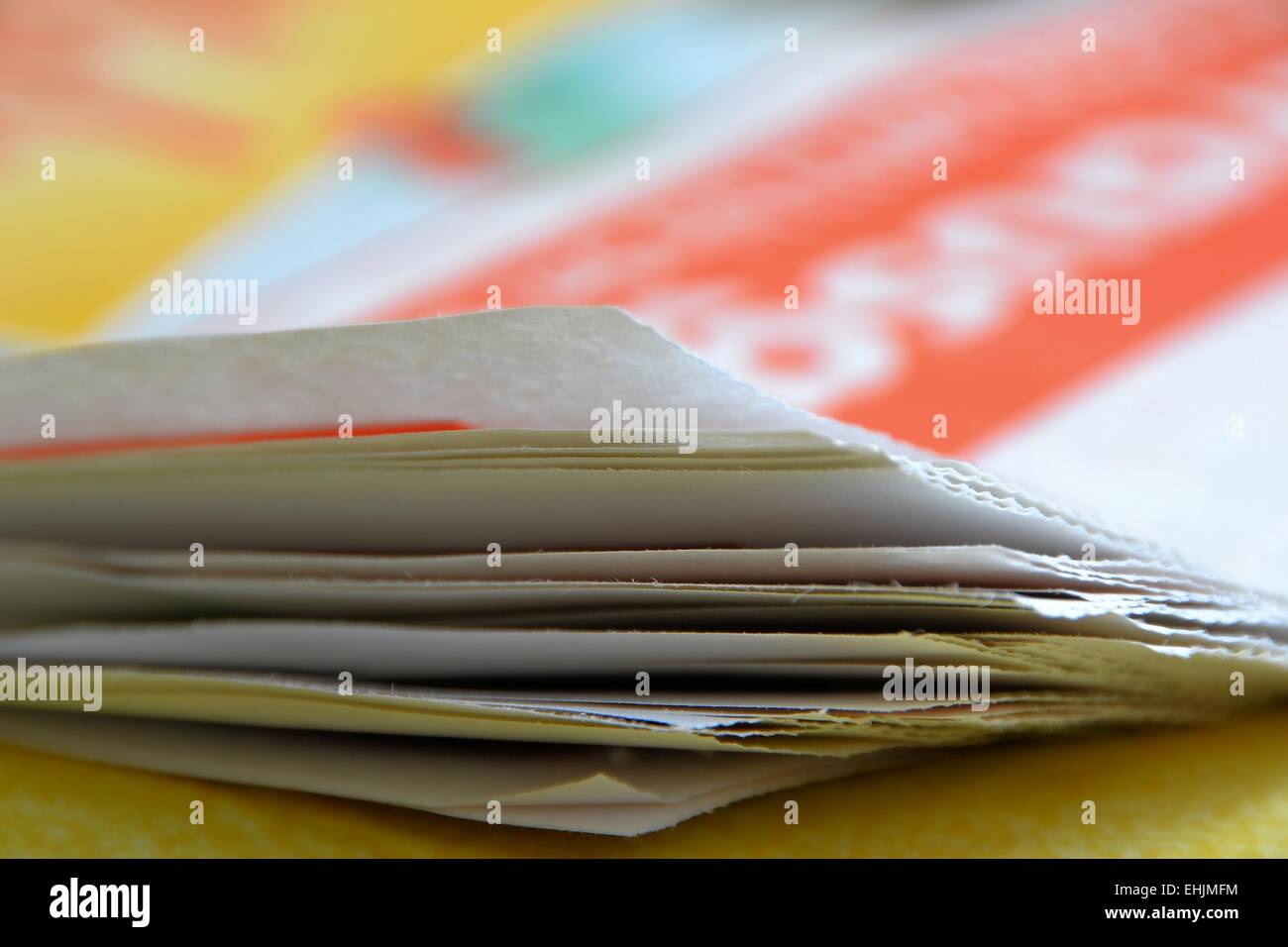 a newspaper lying on a table Stock Photo