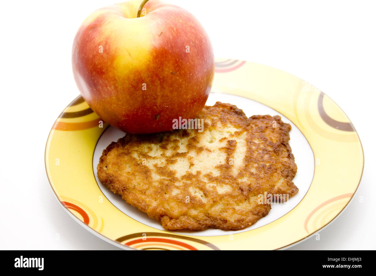 Apple and fried mashed potatoes Stock Photo