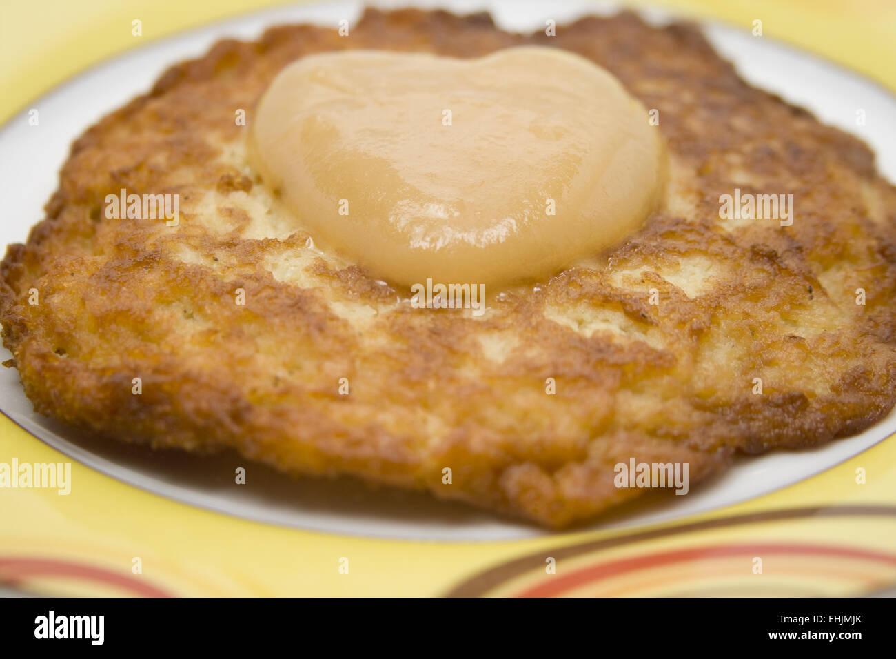 Apple porridge on fried mashed potatoes Stock Photo
