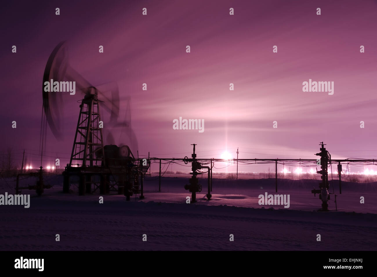 Pump jack and oilwell Stock Photo Alamy