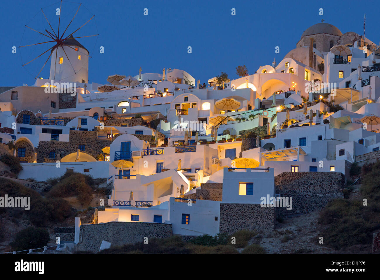Oia with the famous windmill at night Stock Photo
