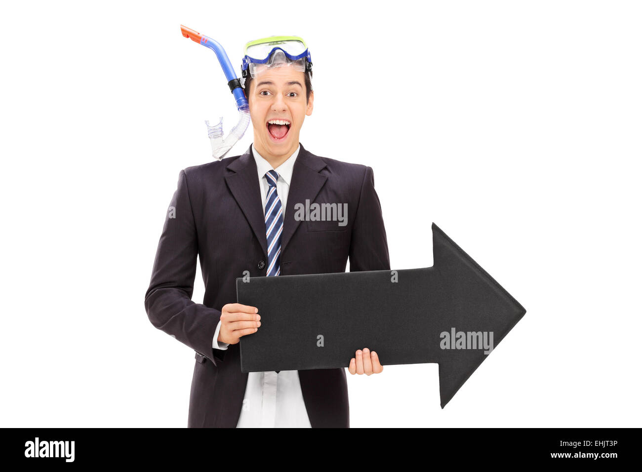 Businessman with diving equipment holding an arrow isolated on white background Stock Photo