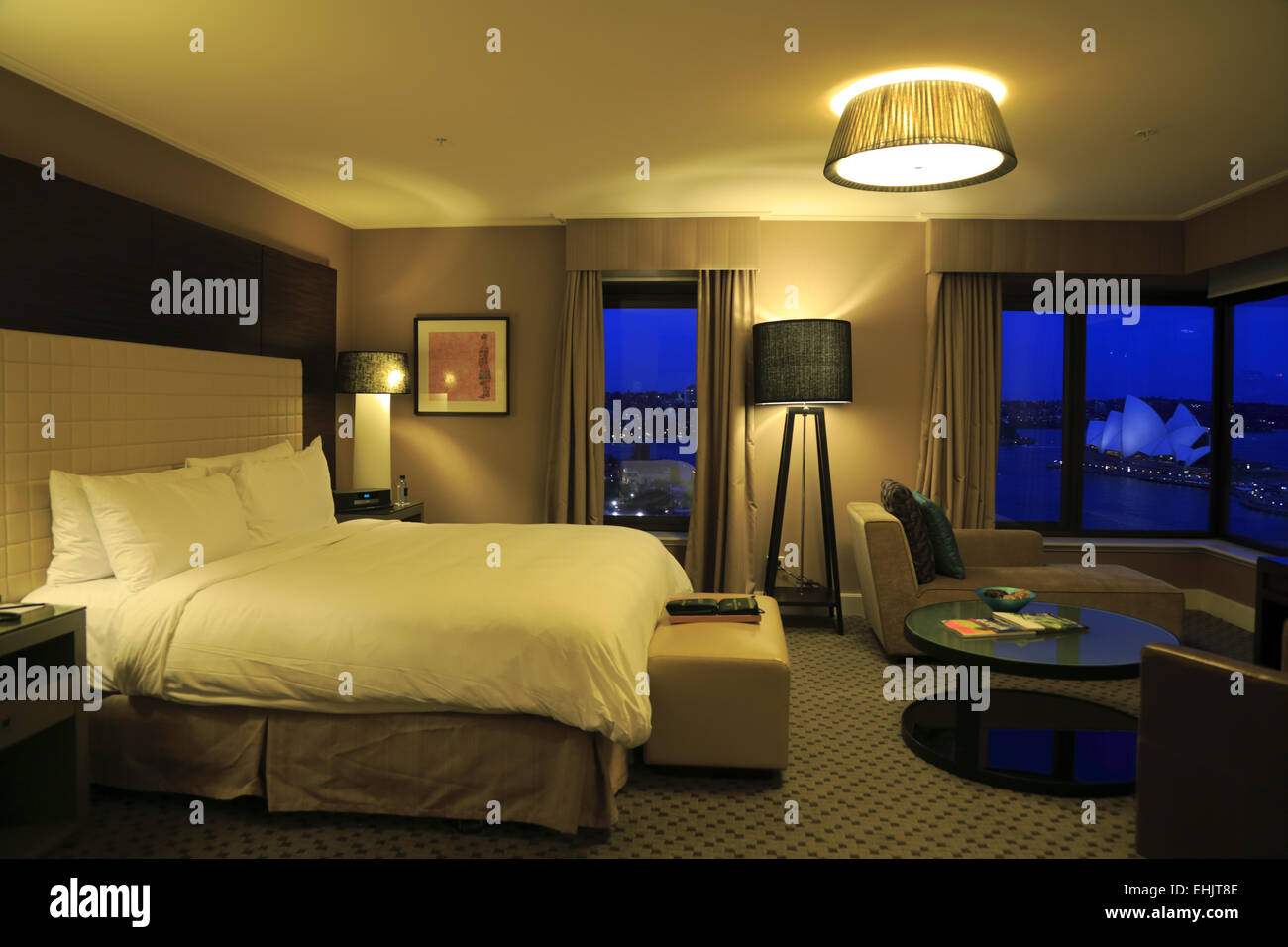 The guest room of Four Seasons Hotel with the view of Sydney Opera House at evening, Sydney, Australia Stock Photo
