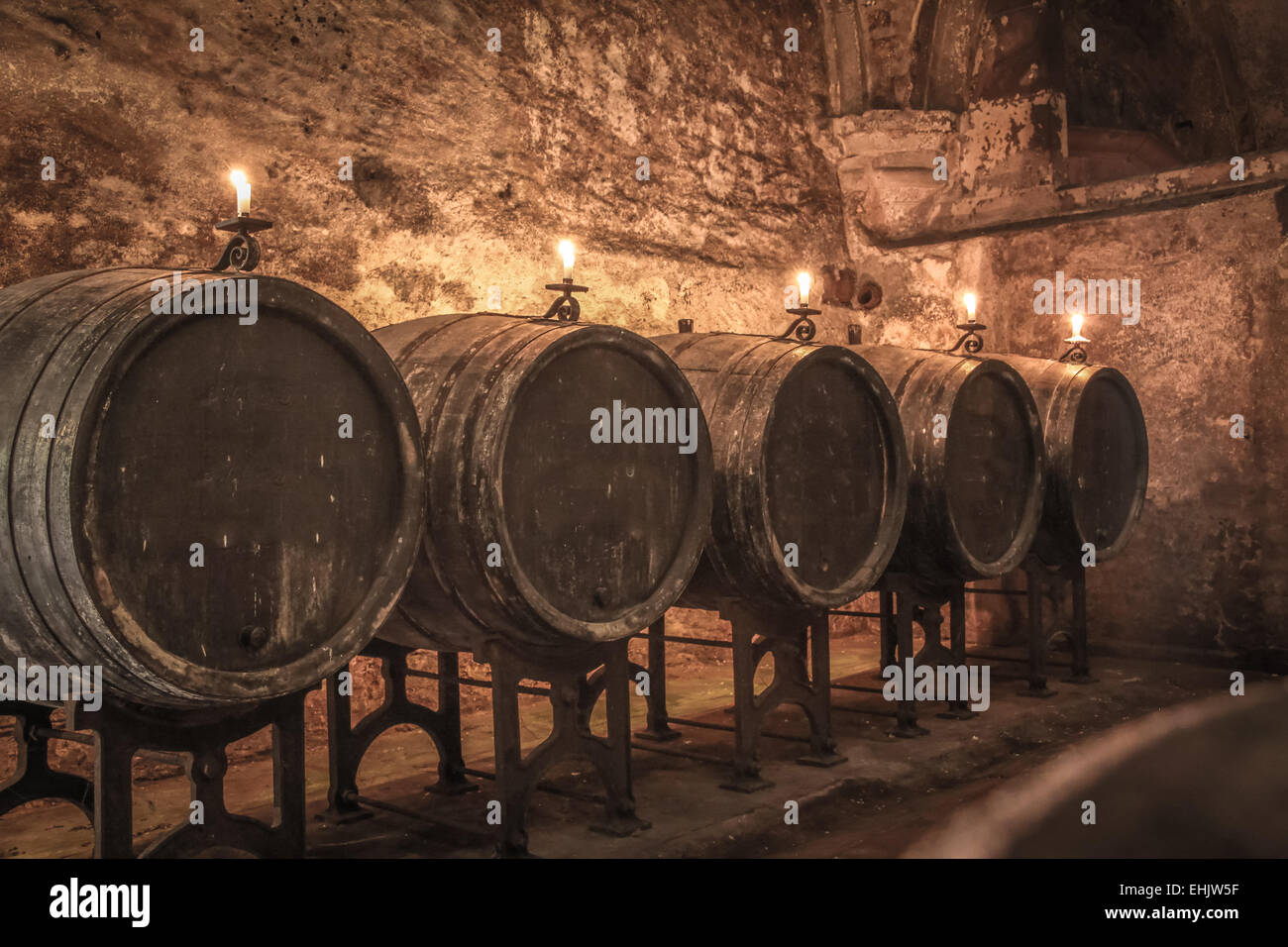 Old wine barrels in winecellar with candles Stock Photo Alamy