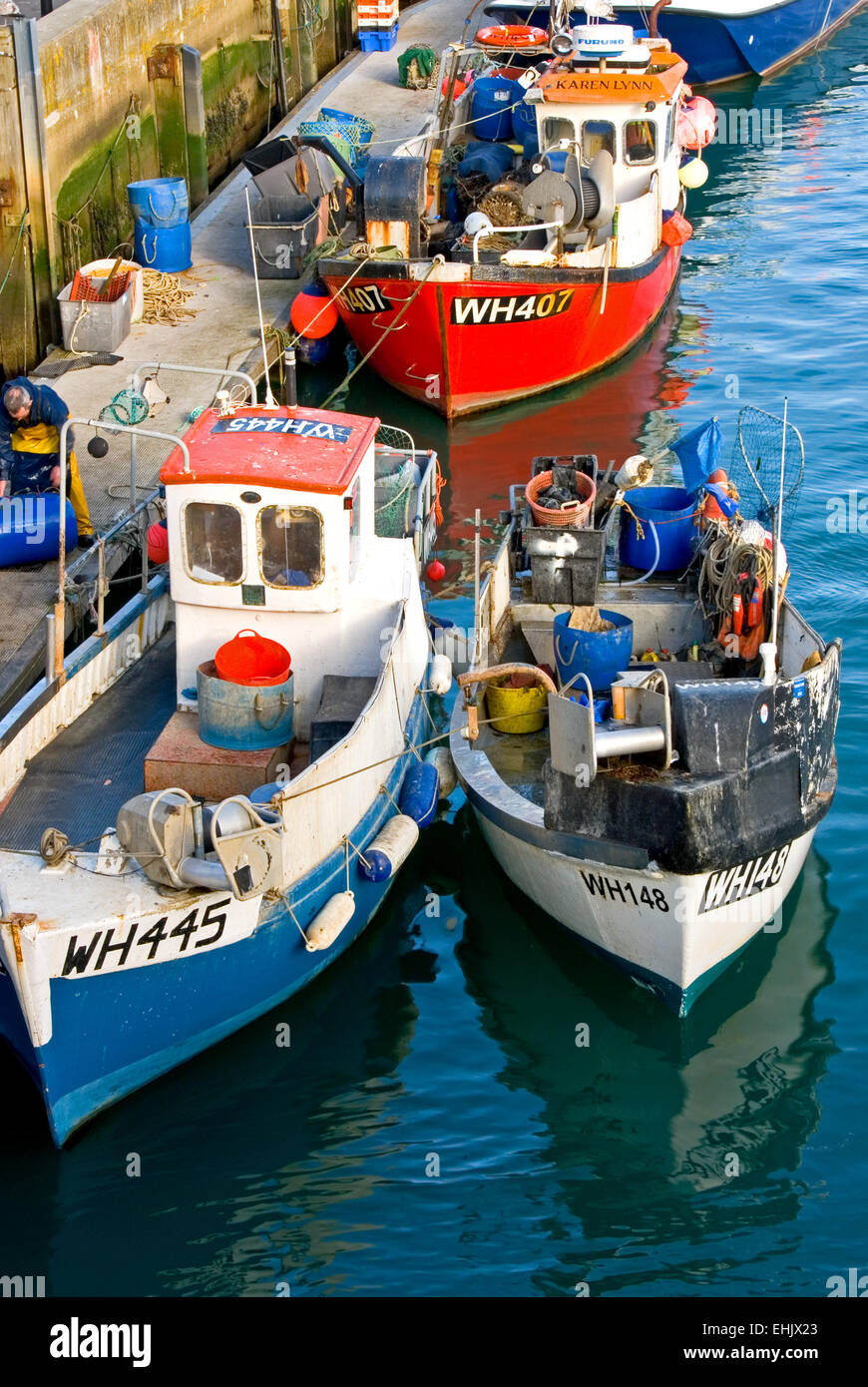Fishing boats colours hi-res stock photography and images - Alamy