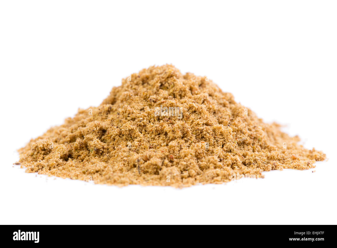 A heap of raw organic coriander spice powder on white background Stock