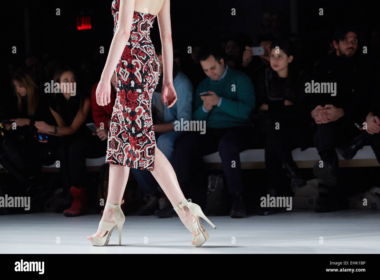 A model walks runway at the New York Life fashion show during MBFW Fall