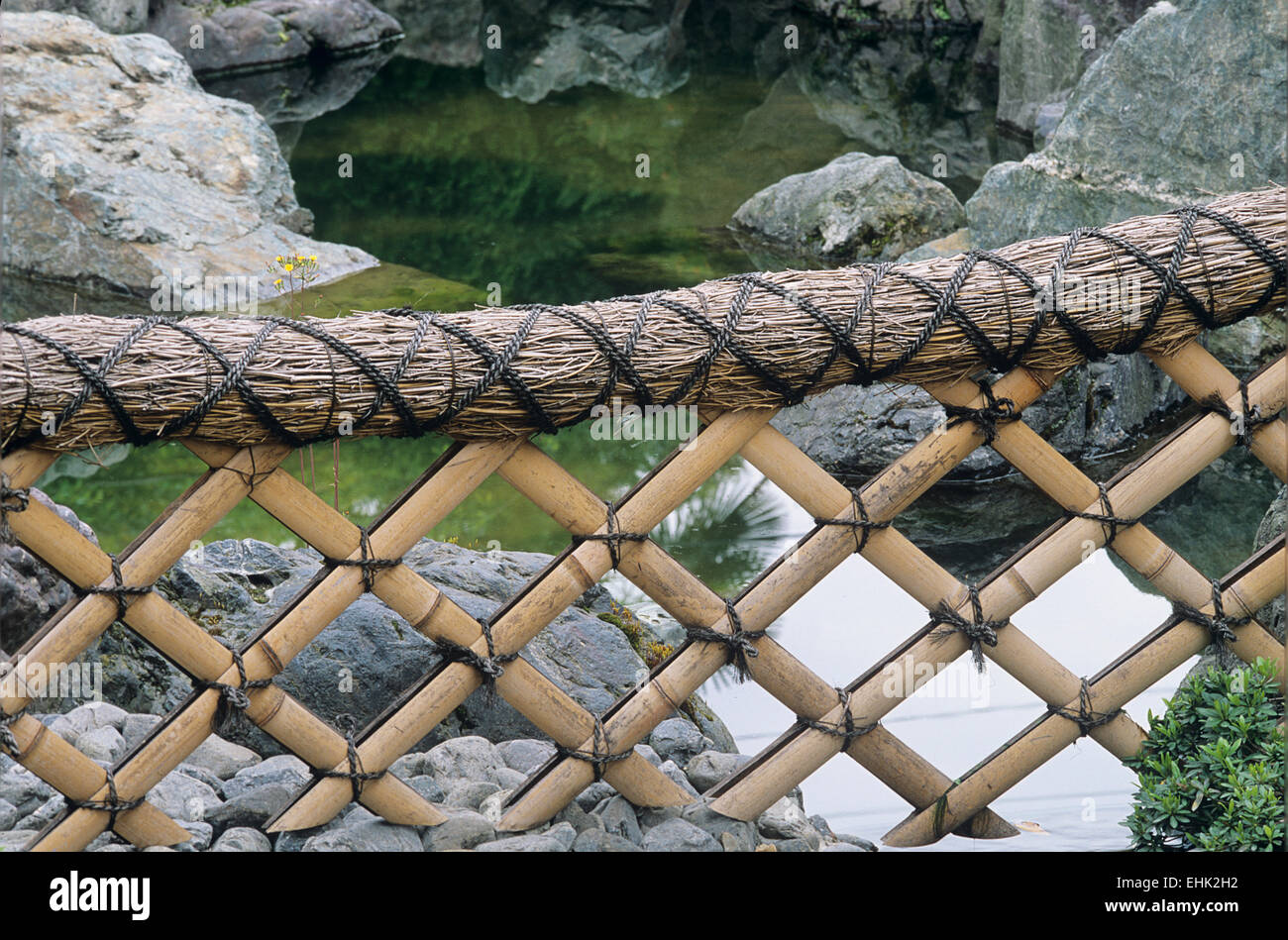 A simple fence constructed of bamboo and rope sums up the Japanese sense of  style and simplicity Stock Photo - Alamy