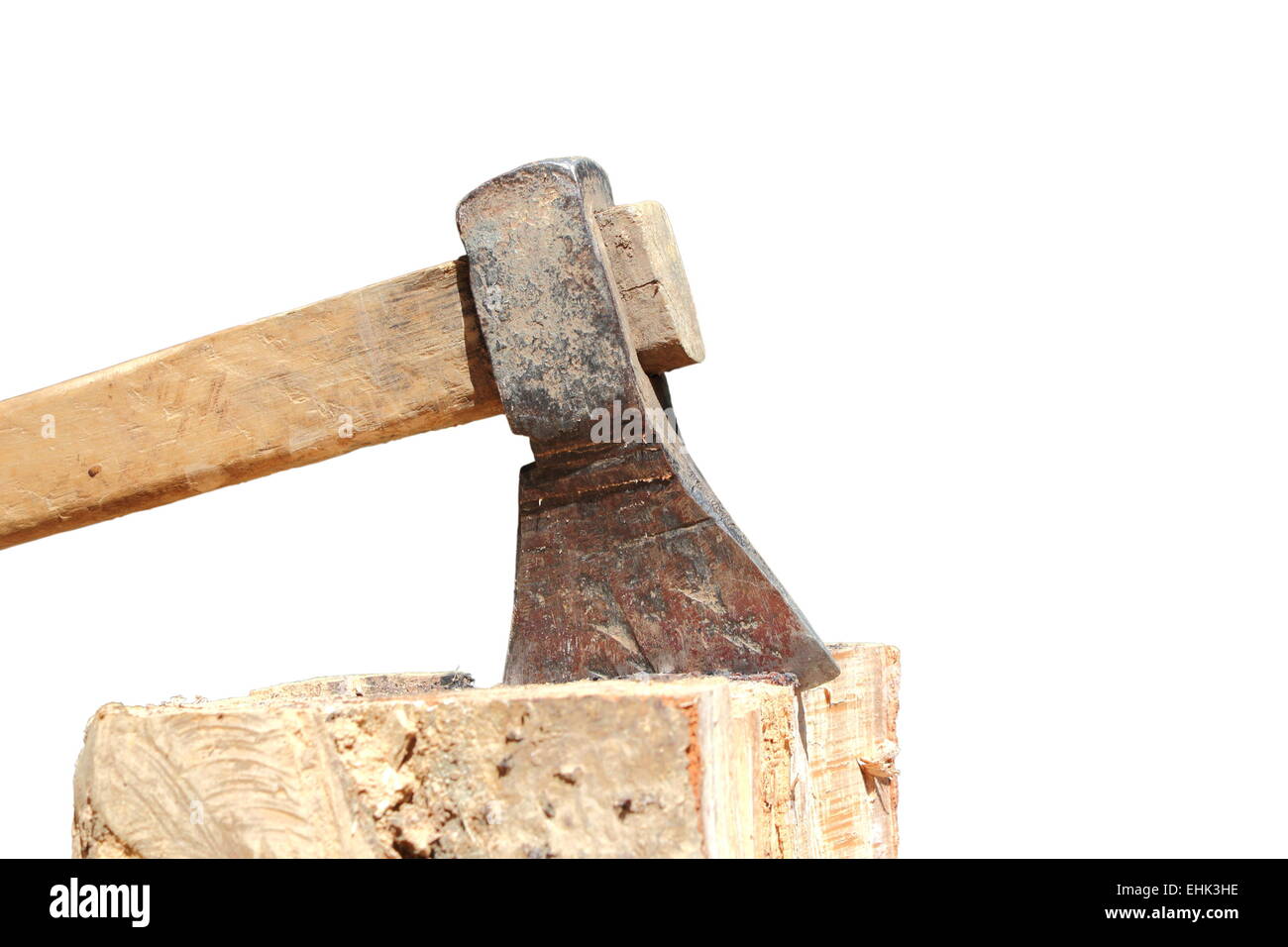 massive ax stuck into a stub isolated on white background Stock Photo