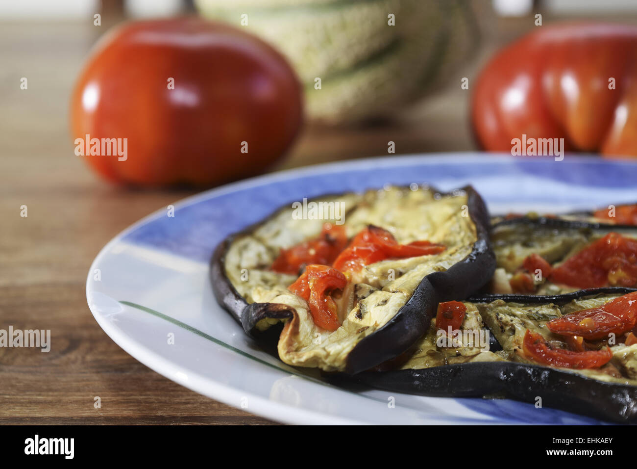 aubergines, tomatoes and fruit  for a vegetarian diet Stock Photo