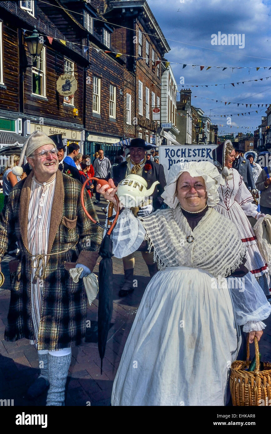Ebenezer Scrooge (from 'A Christmas Carol') in a procession. Rochester Dickens festival. Kent. UK Stock Photo