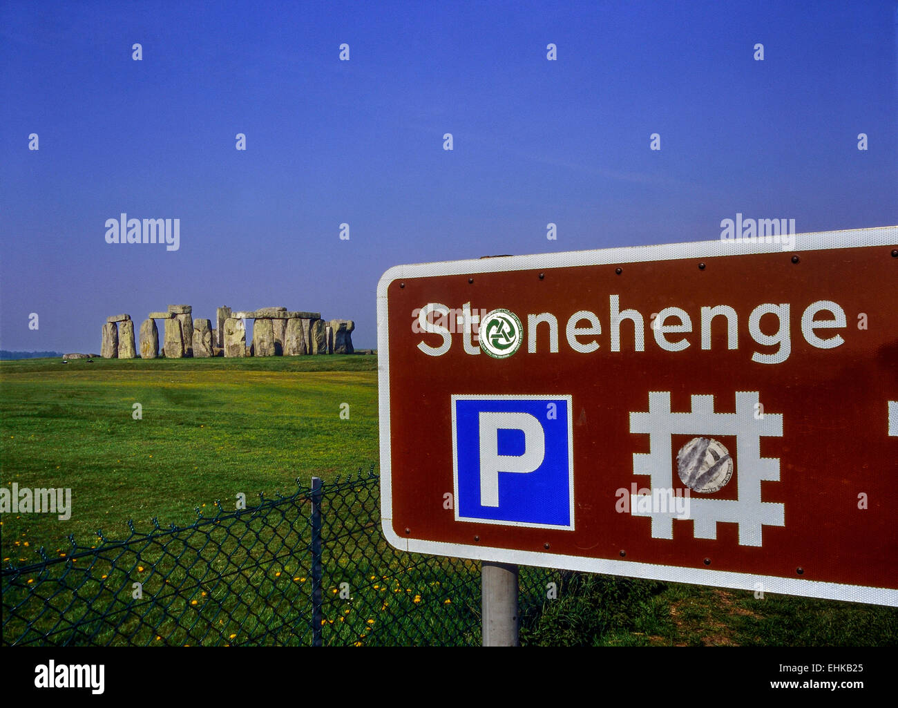 Tourist signpost and car parking at Stonehenge. Wiltshire, England, Stock Photo