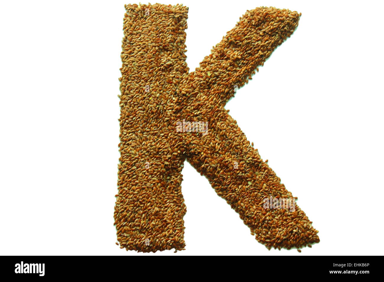 on a white background from flax seeds lined letter k Stock Photo - Alamy
