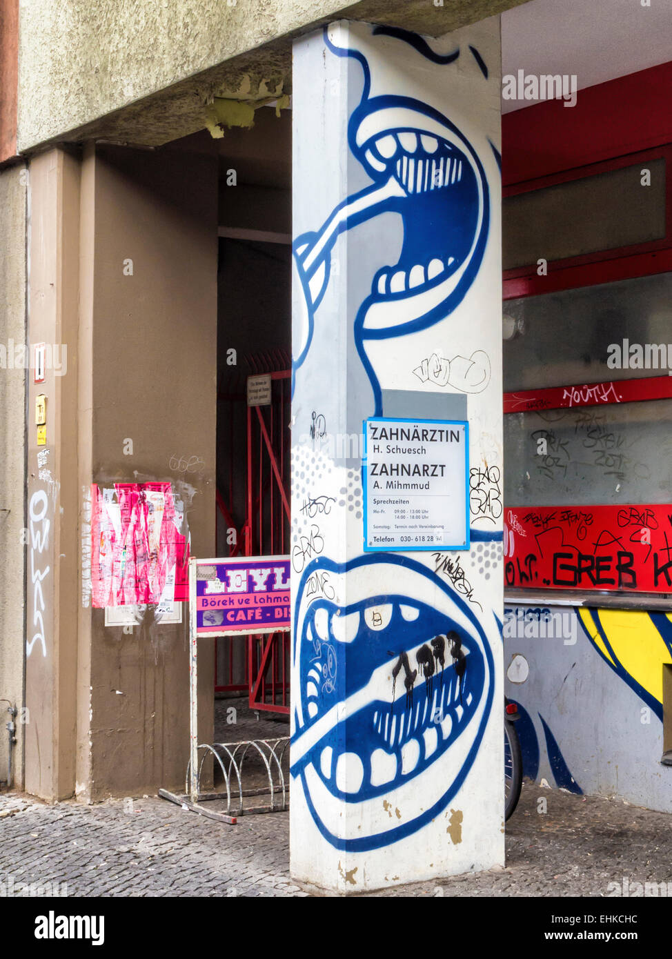 Entrance to dental practice with artwork and graffiti, Kreuzberg, Berlin Stock Photo