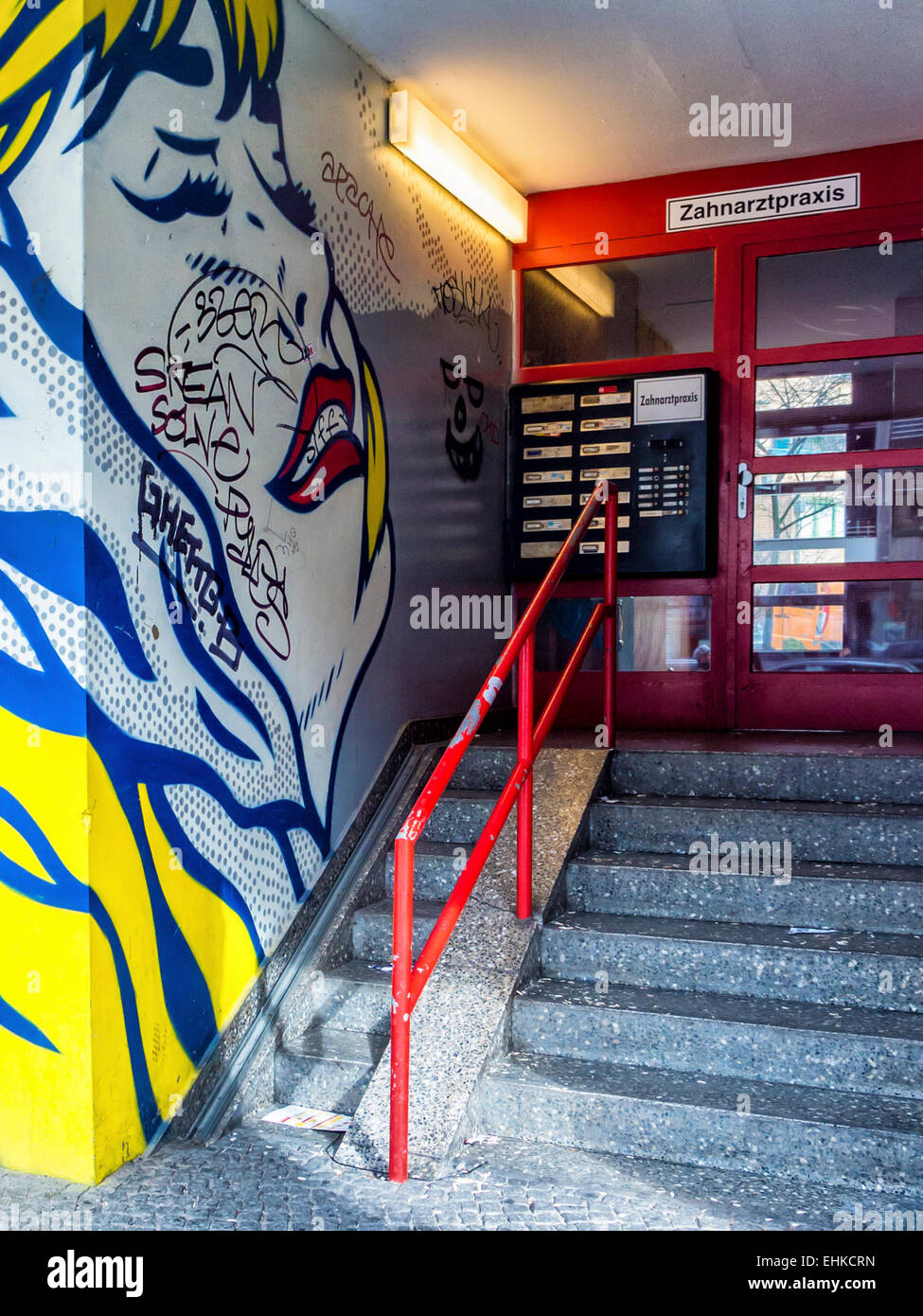 Entrance to dental practice with artwork and graffiti, Kreuzberg, Berlin Stock Photo