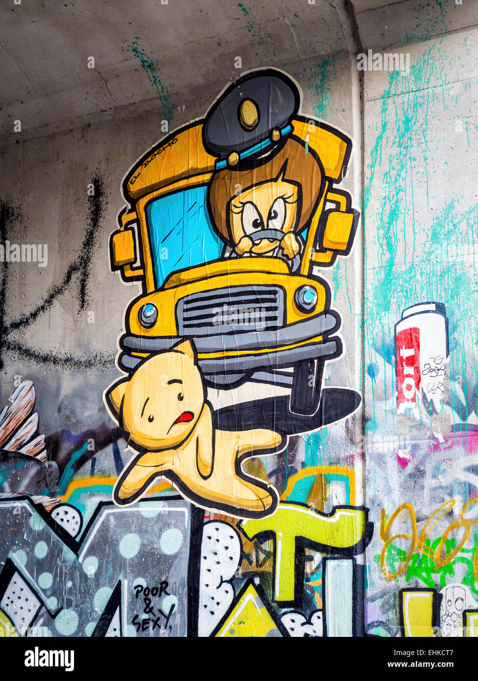 Street art by El Bocho, Little Lucy kills her cat series, Mitte Berlin Stock Photo