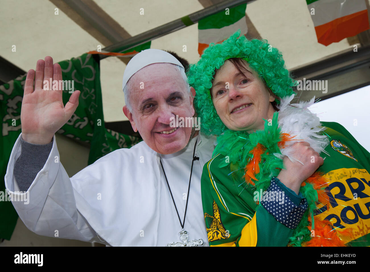 Pope in costume at the St Patrick's weekend Irish Festival.  The Pope and friends at the St Patrick's weekend Irish Festival.  Thousands of people lined the streets to watch as the St Patrick’s Day parade made its way through Manchester.  The colourful procession set off from the Irish World Heritage Centre in Cheetham Hill before making its way to Albert Square. Stock Photo