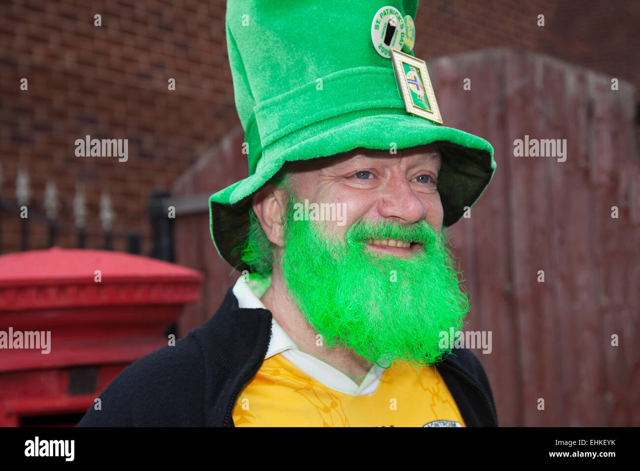 Manchester, UK 15th March, 2015.  The St Patrick's weekend Irish Festival.  Thousands of people lined the streets to watch as the St Patrick’s Day parade made its way through Manchester.  The colourful procession set off from the Irish World Heritage Centre in Cheetham Hill before making its way to Albert Square.  Flag bearers representing the 32 counties in the Emerald Isle led the parade into the city centre, followed by floats from the city’s Irish associations. Stock Photo