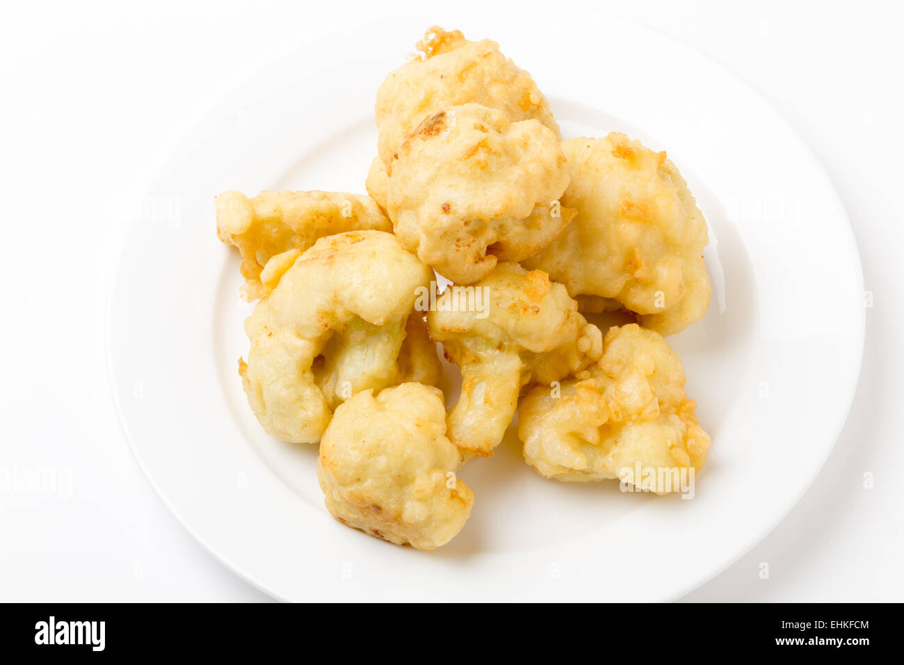 Florets of cauliflower parboiled then dipped in batter and deep fried Stock Photo