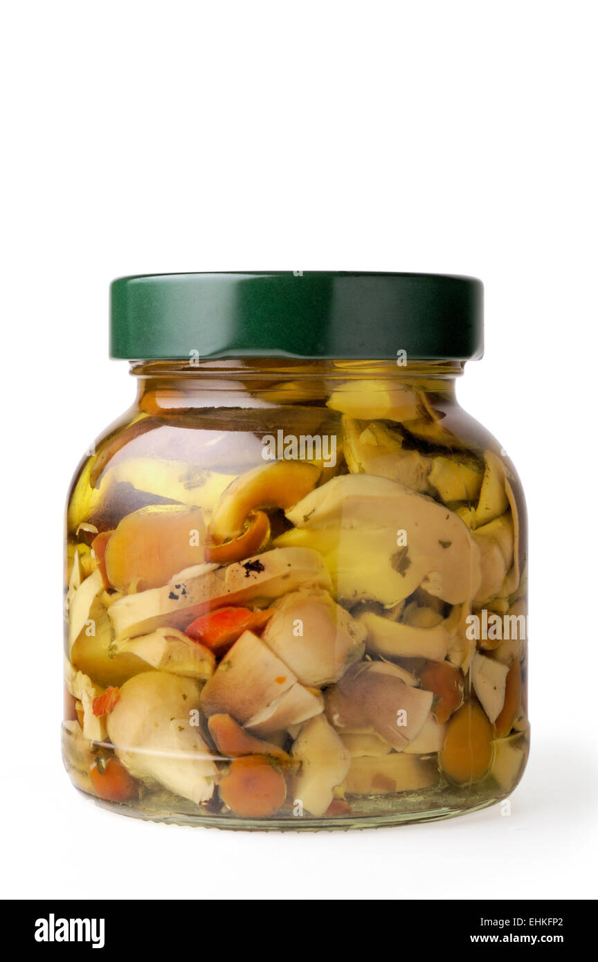 Glass jar of preserved mushrooms  (vertical closeup) Stock Photo