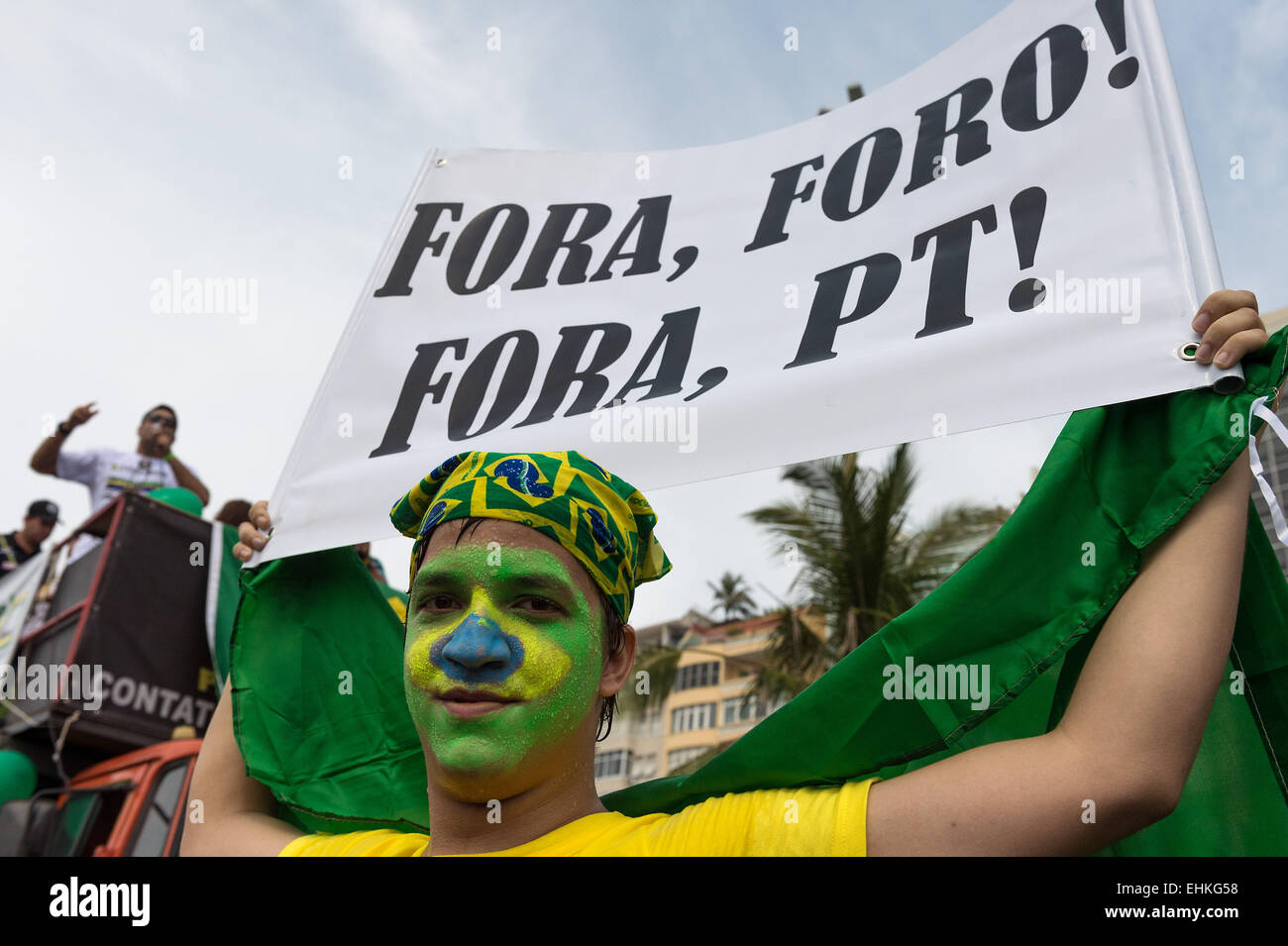 Rio De Janeiro, RJ, Brazil. 16th Mar, 2015. Young protester send a message to the PT party, '' OUT PT''.On Sunday, March 15th, a big crowd is gathering at Copacabana beach, south side of Rio City, Brazil. People from everywhere and all social classes, came to the streets to protest against Dilma Roussef, and are demanding her impeachment. They claim for justice, dignity, security, education and are saying ''No More Corruption' Credit:  Peter Bauza/ZUMA Wire/ZUMAPRESS.com/Alamy Live News Stock Photo