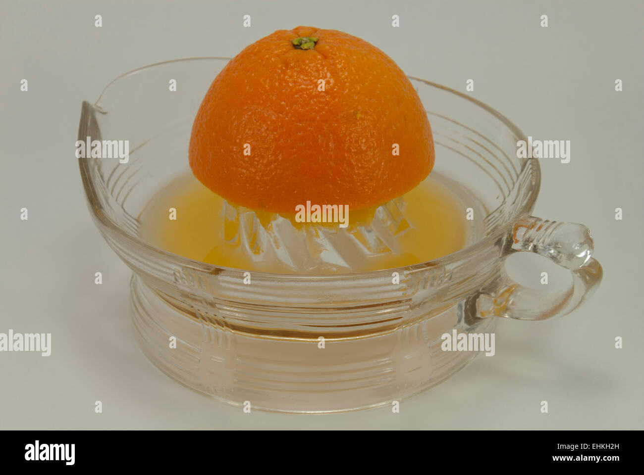 Oranges to Orange Juice. The whole fruit to homemade juice Stock Photo