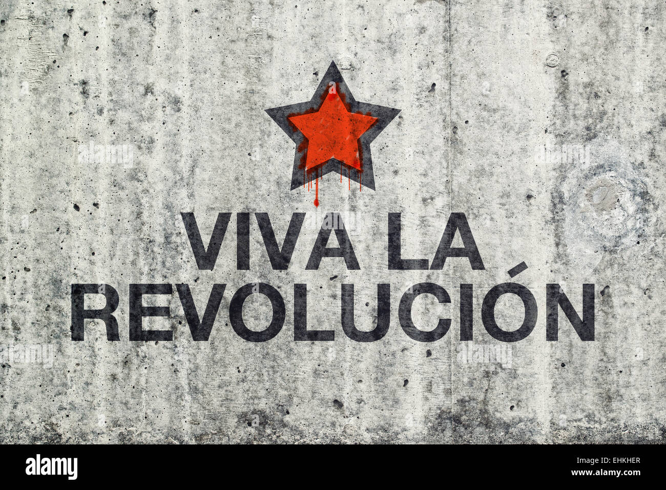 Viva La Revolucion Graffiti on Gray Cement Street Wall, Revolution Concept. Stock Photo