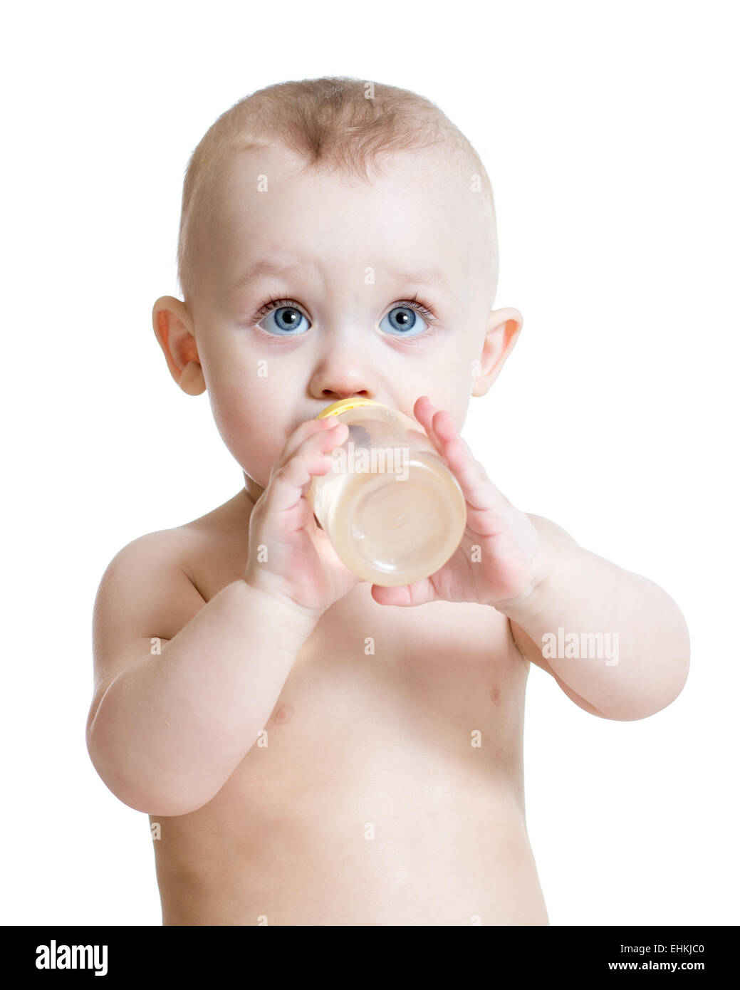 adorable child drinking from bottle Stock Photo