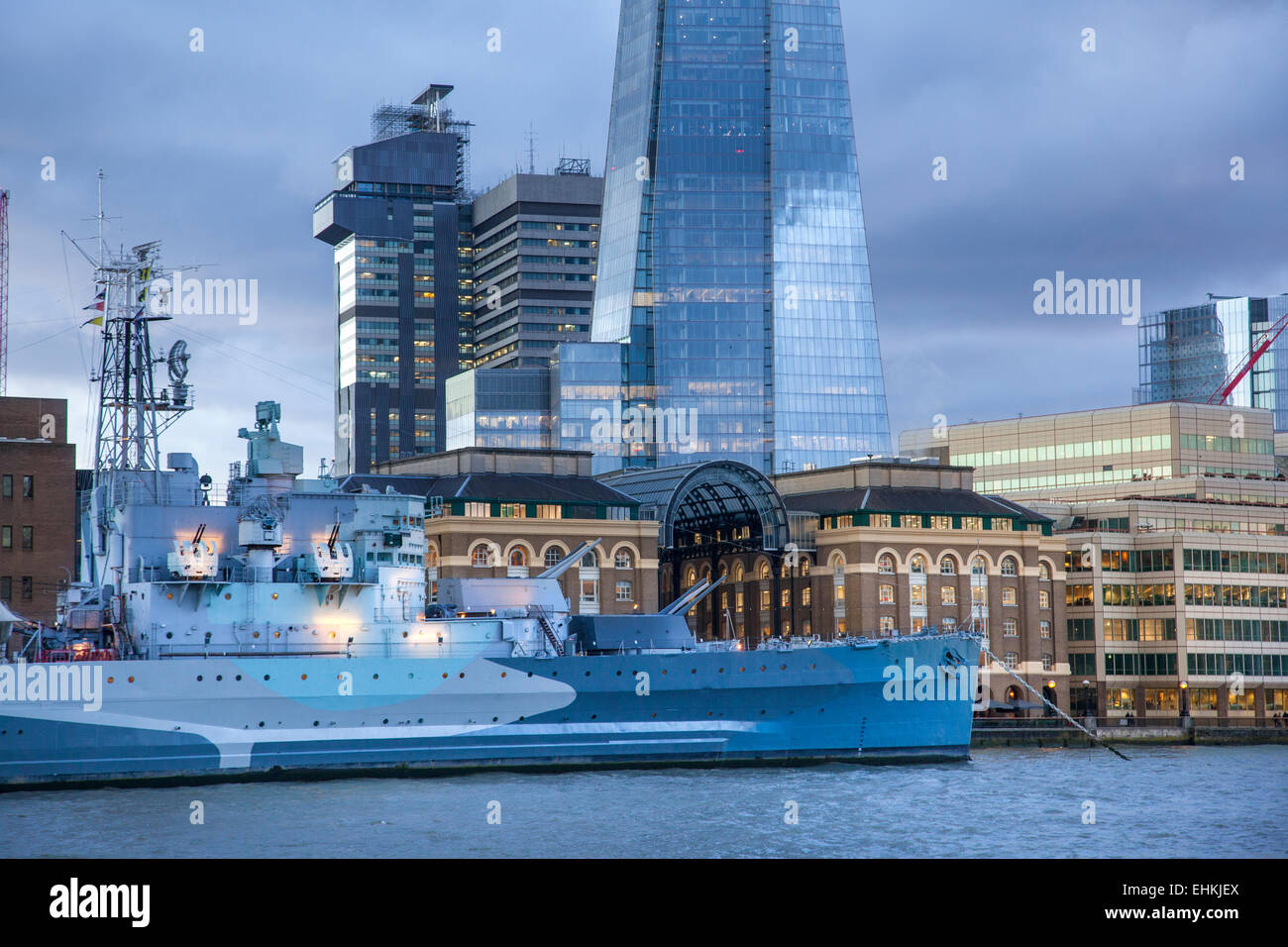 HMS Belfast with The Shard in the background River Thames London Stock Photo