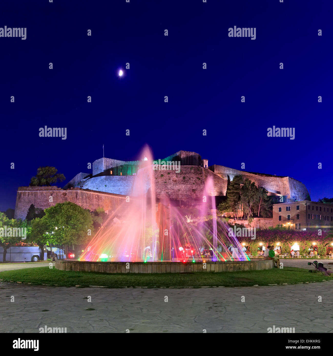 Colored water fountain at night, Corfu city Stock Photo - Alamy
