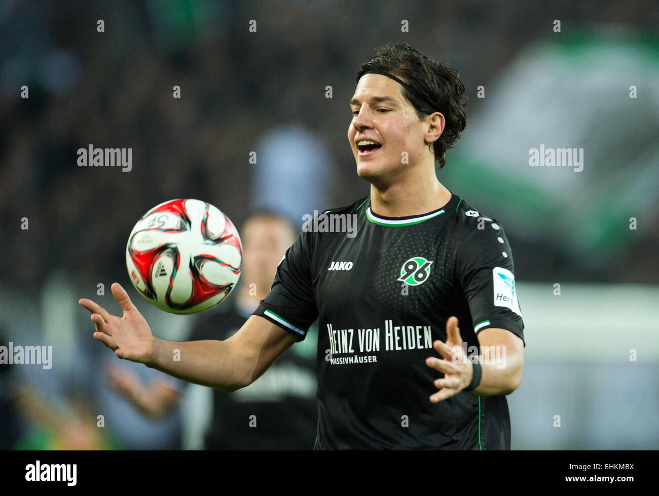Moenchengladbach, Germany. 15th Mar, 2015. Hannover's Miiko Albornoz catchs the ball during the German Bundesliga soccer match between Borussia Moenchengladbach vs Hannover 96 in Moenchengladbach, Germany, 15 March 2015. (EMBARGO CONDITIONS - ATTENTION - Due to the accreditation guidelines, the DFL only permits the publication and utilisation of up to 15 pictures per match on the internet and in online media during the match) Photo: BERND THISSEN/dpa/Alamy Live News Stock Photo