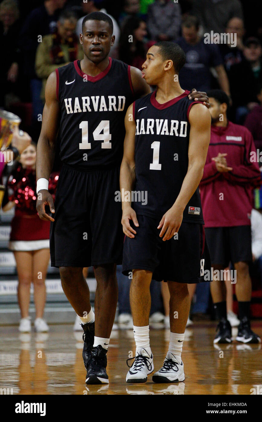 March 14, 2015: Harvard Crimson forward Steve Moundou-Missi (14) looks on with guard Siyani Chambers (1) during the NCAA basketball game between the Yale Bulldogs and the Harvard Crimson at the Palestra in Philadelphia, Pennsylvania. The Harvard Crimson won 53-51 to win the Ivy League Playoff game. Stock Photo