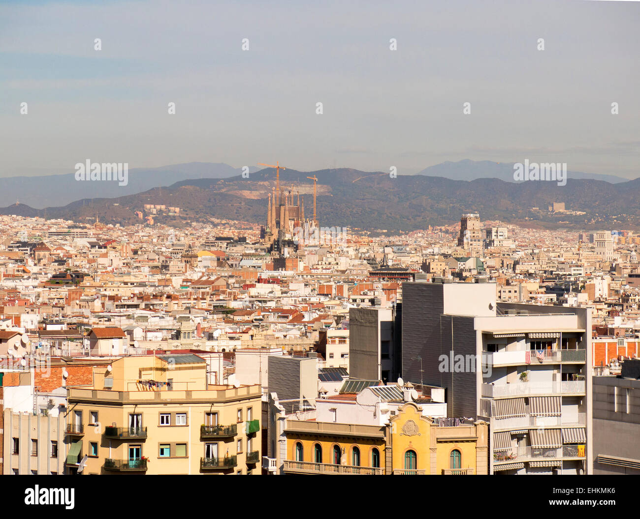 Skyline viewed from Montjuic District towards la Sagrada Familia cathedral Barcelona Spain Stock Photo
