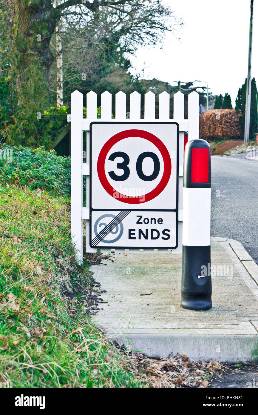 Sign advising of change in speed limit on a UK road Stock Photo