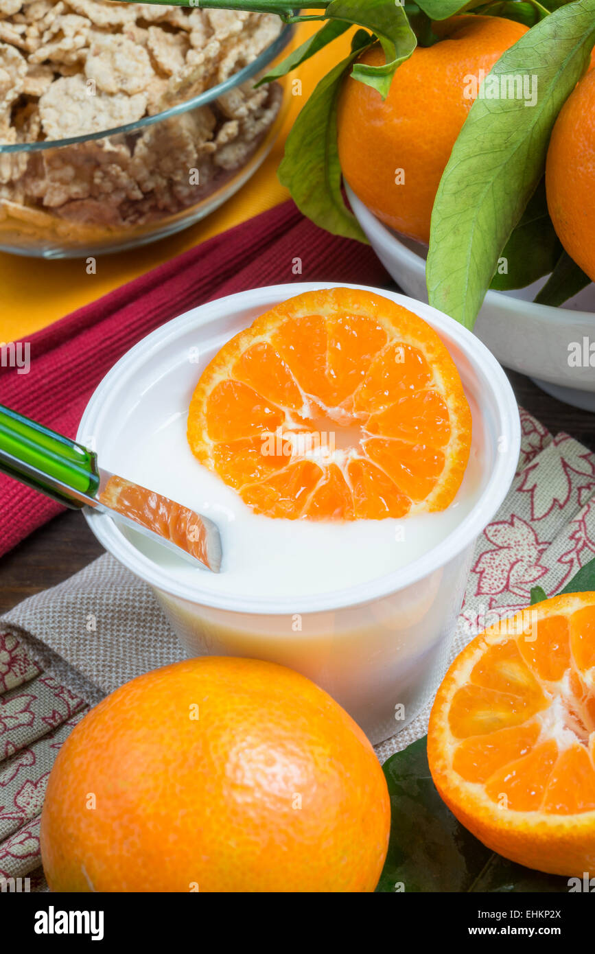 lowfat plain yogurt creamy orange flavor Stock Photo Alamy