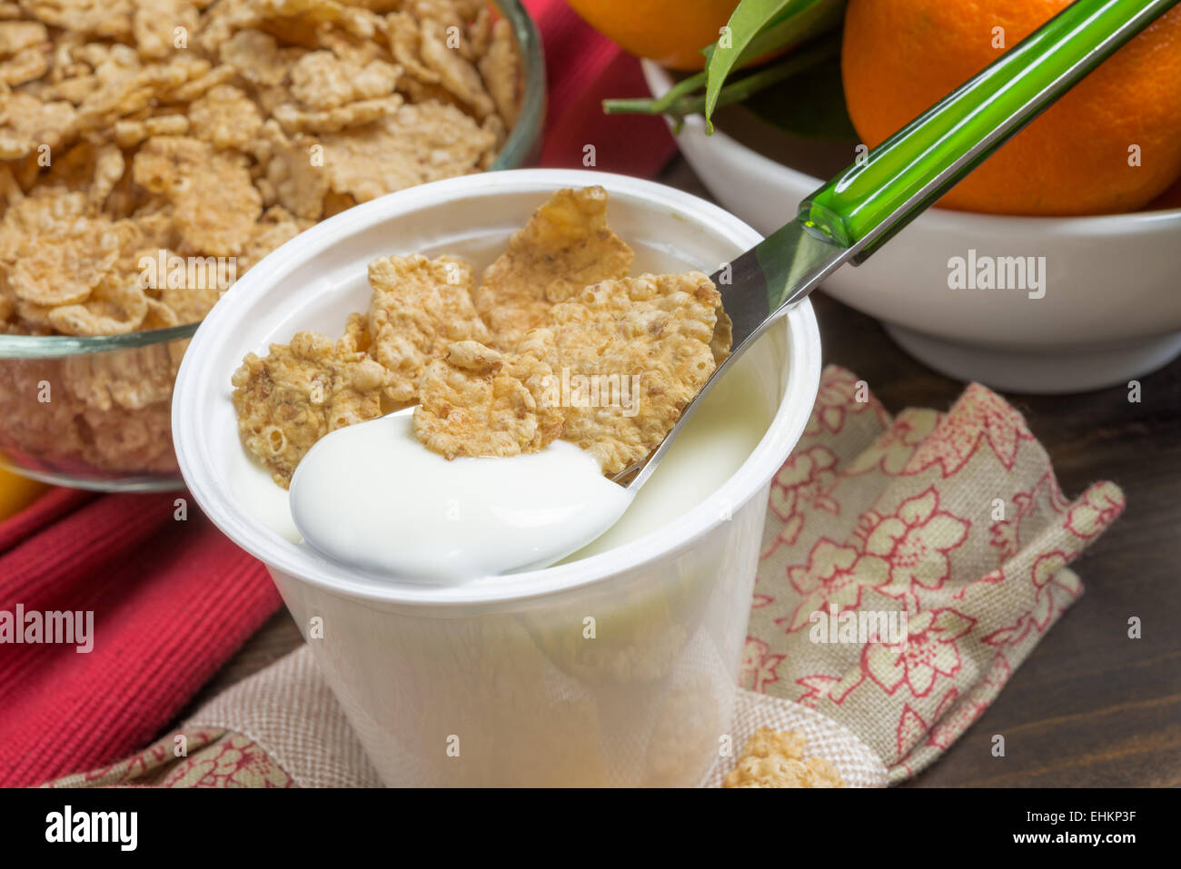 lowfat plain yogurt creamy with crispy cereals Stock Photo Alamy