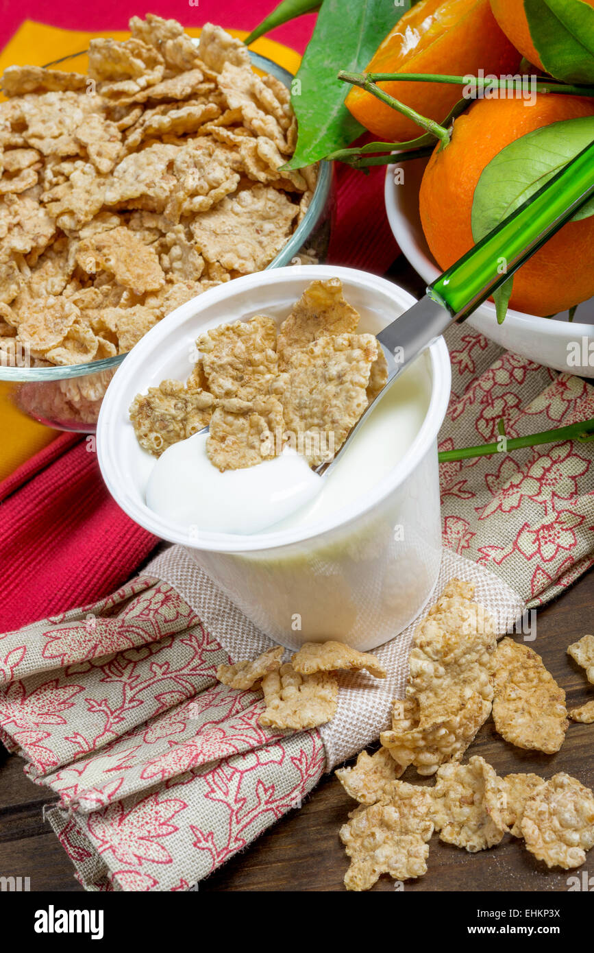 lowfat plain yogurt creamy with crispy cereals Stock Photo Alamy