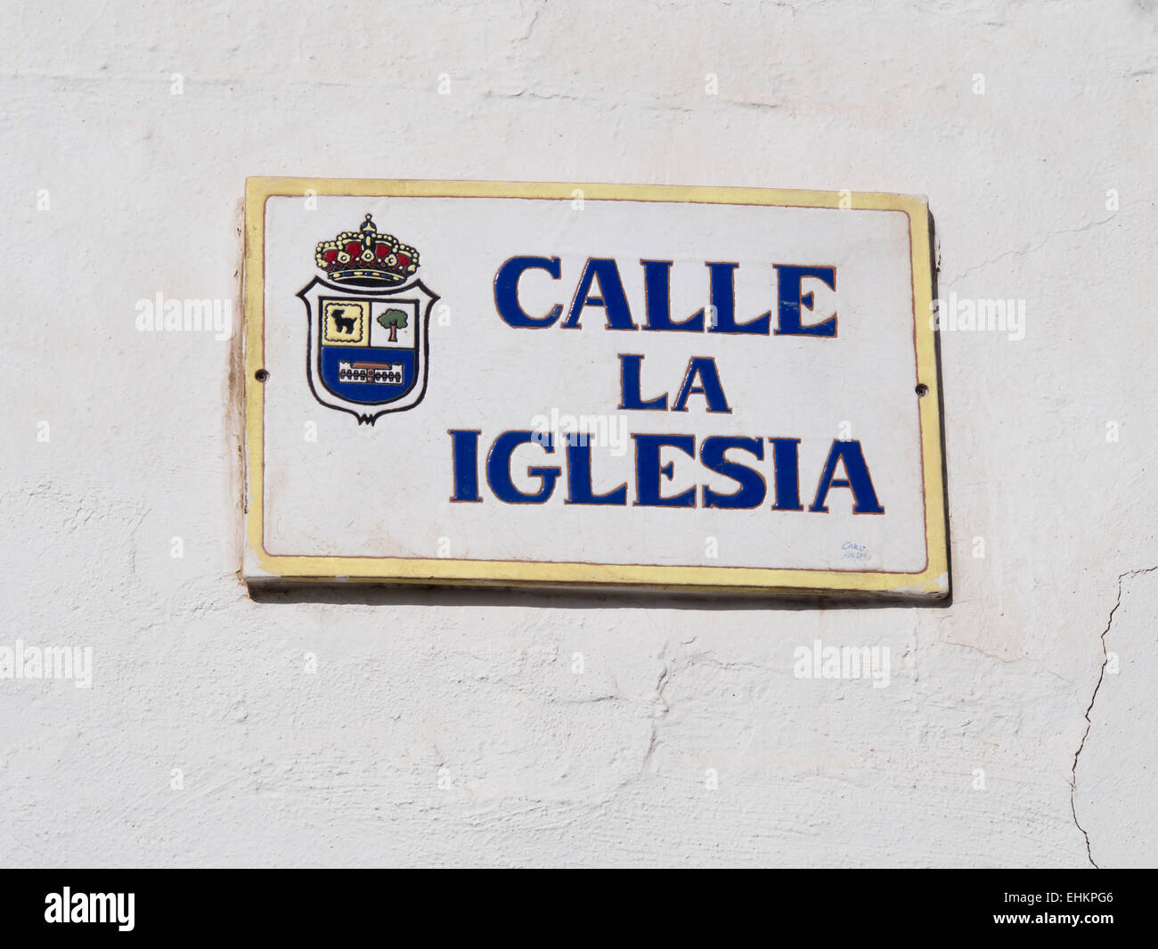 Calle la Iglesia, church street, blue and white tile sign with crest in Corralejo Fuerteventura, Canary islands Spain Stock Photo